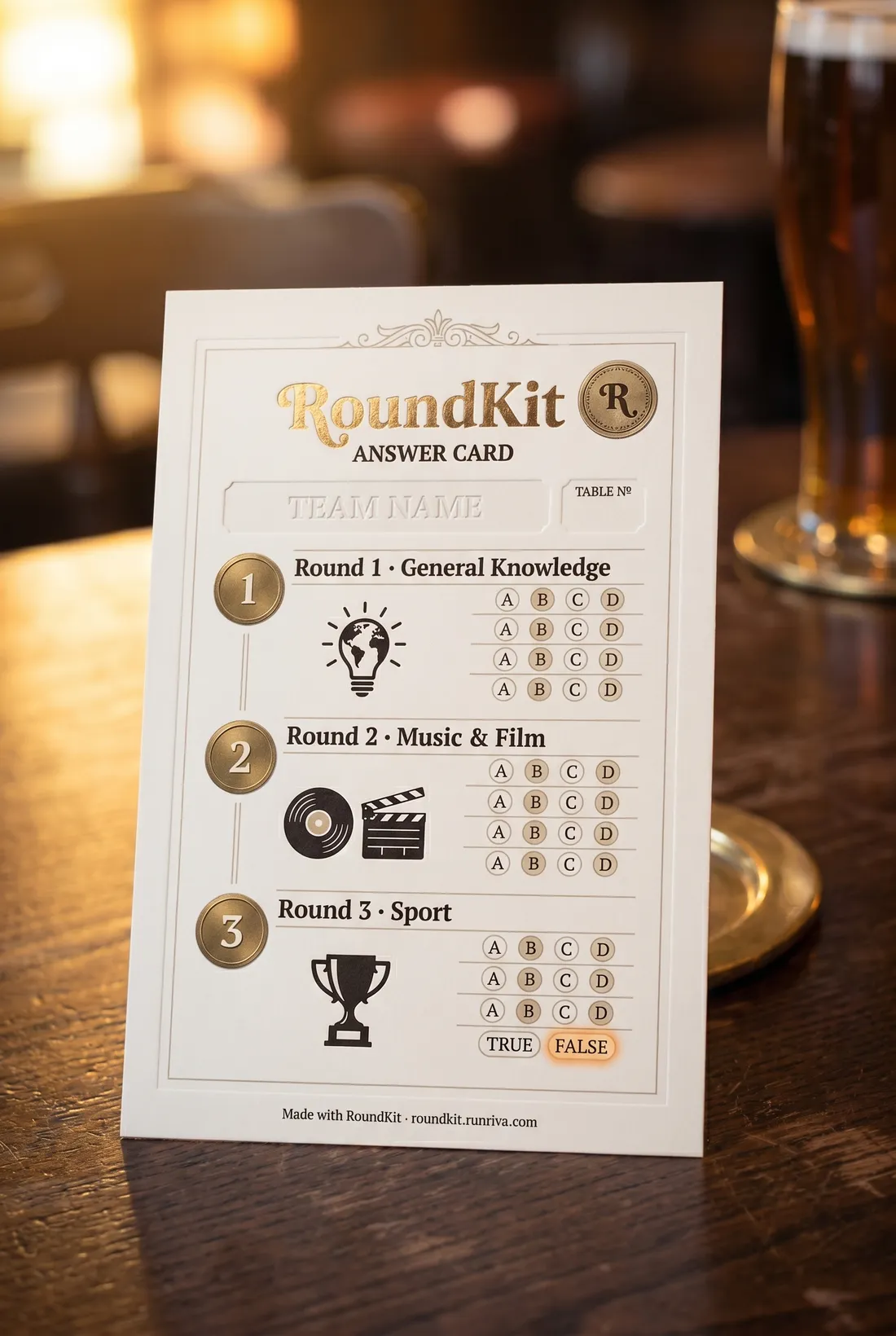 A printed RoundKit scoresheet on a pub table